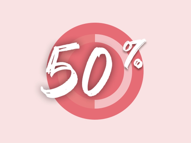 "Text '50%' in white, stylized font over a red circle on a pale pink background. Conveys a discount or sale offer. Minimalist and bold design."