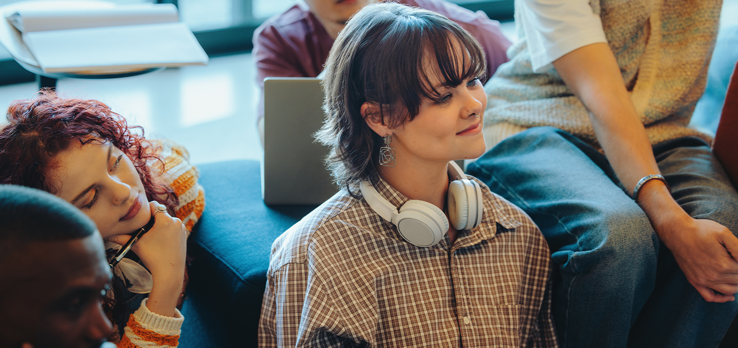Person with his headphones in a meeting room