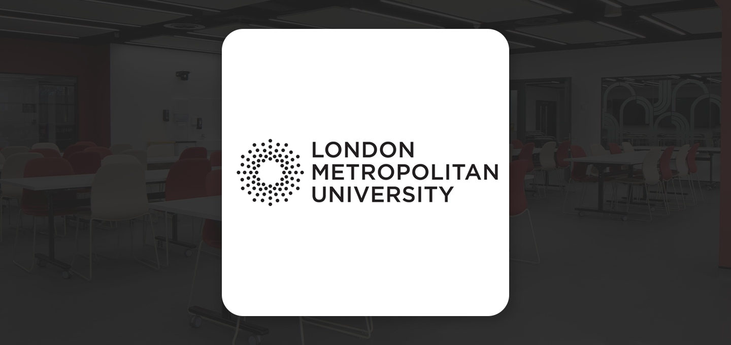 Classroom with tables and red-and-white chairs, overlaid with the London Metropolitan University logo.