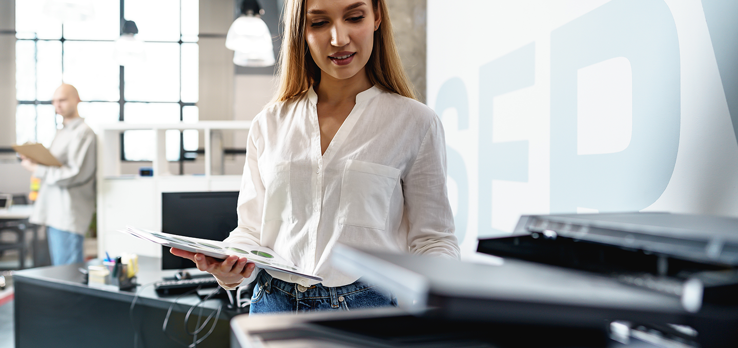 A professional buying a new printer and considering total cost of ownership